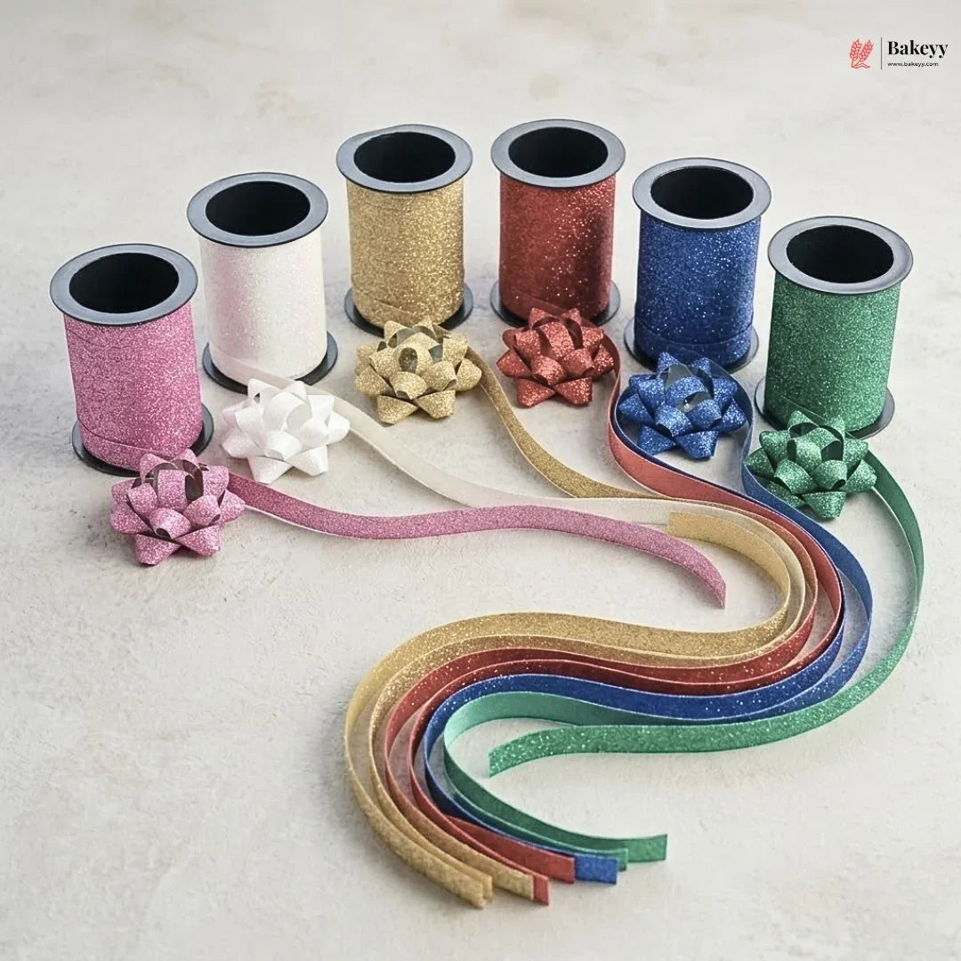 Colorful ribbon spools with decorative bows on a light background