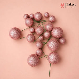 Decorative pink glittery spheres on a beige background with 'Bakeyy' branding.