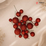 Red decorative balls on a beige fabric background with 'Bakeyv' branding.