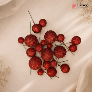 Red decorative balls on a beige fabric background with 'Bakeyv' branding.