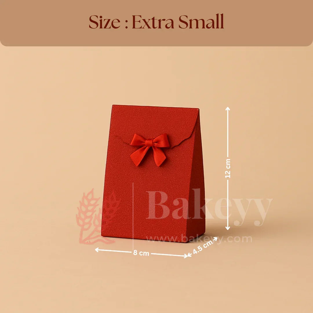 Red gift bag with a bow and measurements on a beige background, featuring the brand 'Bakeyy'.
