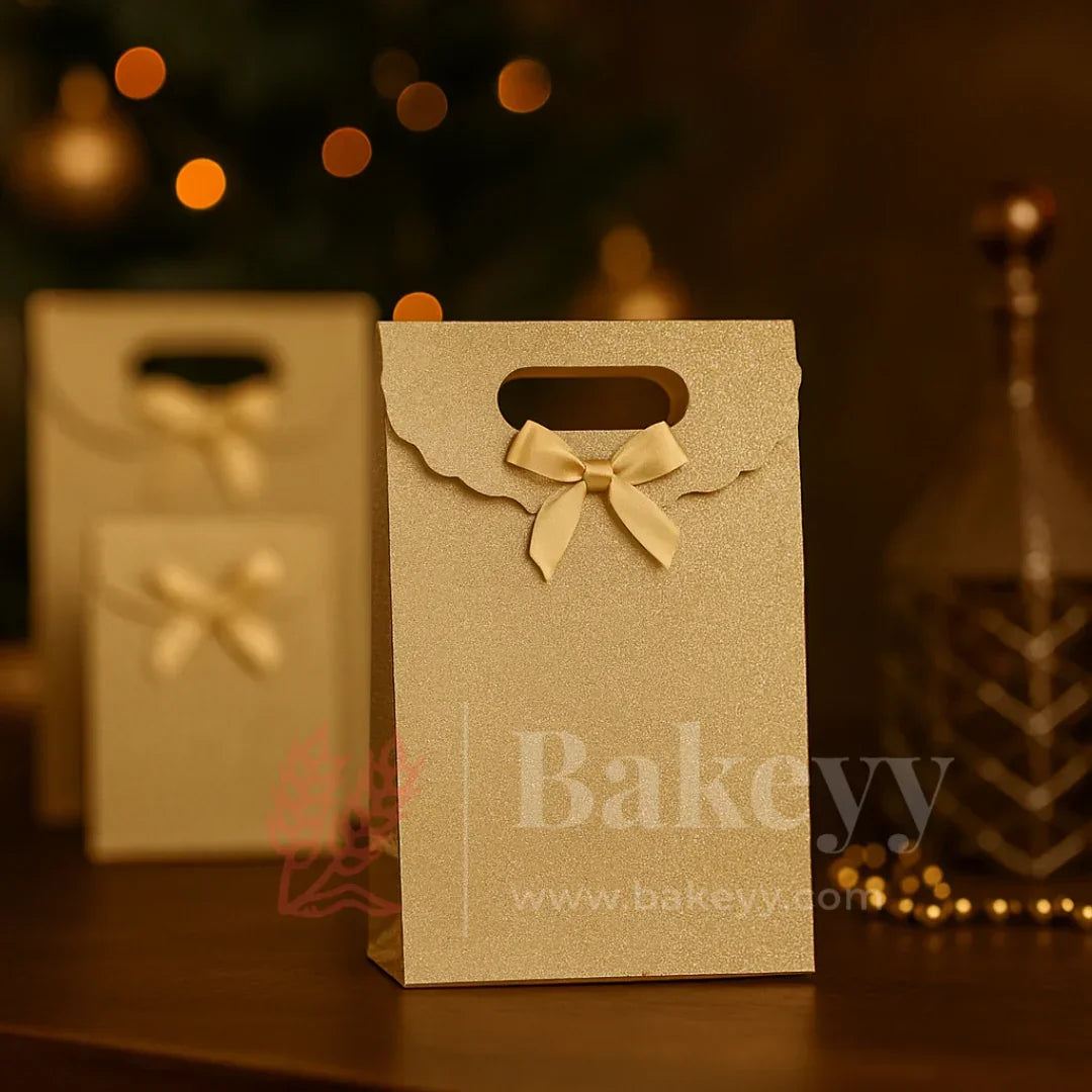 Kraft paper gift bag with a bow and 'Bakeyy' branding on a blurred background