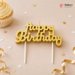 Gold 'Happy Birthday' cake topper with a cupcake on a beige background, featuring the Bakeyy brand.