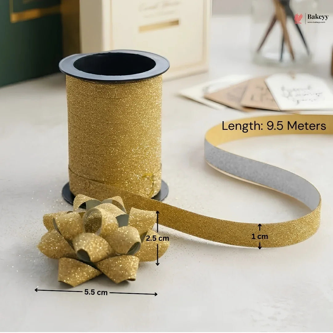 Gold glitter ribbon with a bow and measurements on a light surface