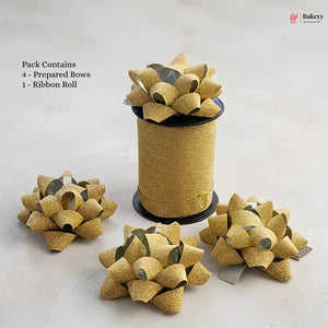 Gold glittery ribbons with prepared bows on a white background, featuring Bakeyy branding.