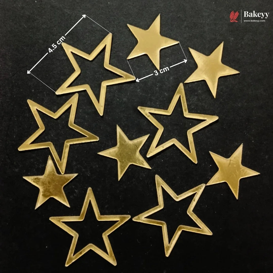 Nine gold-colored star-shaped metal beads or charms arranged on a black background, with white dimension lines and text indicating 4.5 cm by 3 cm measurements.