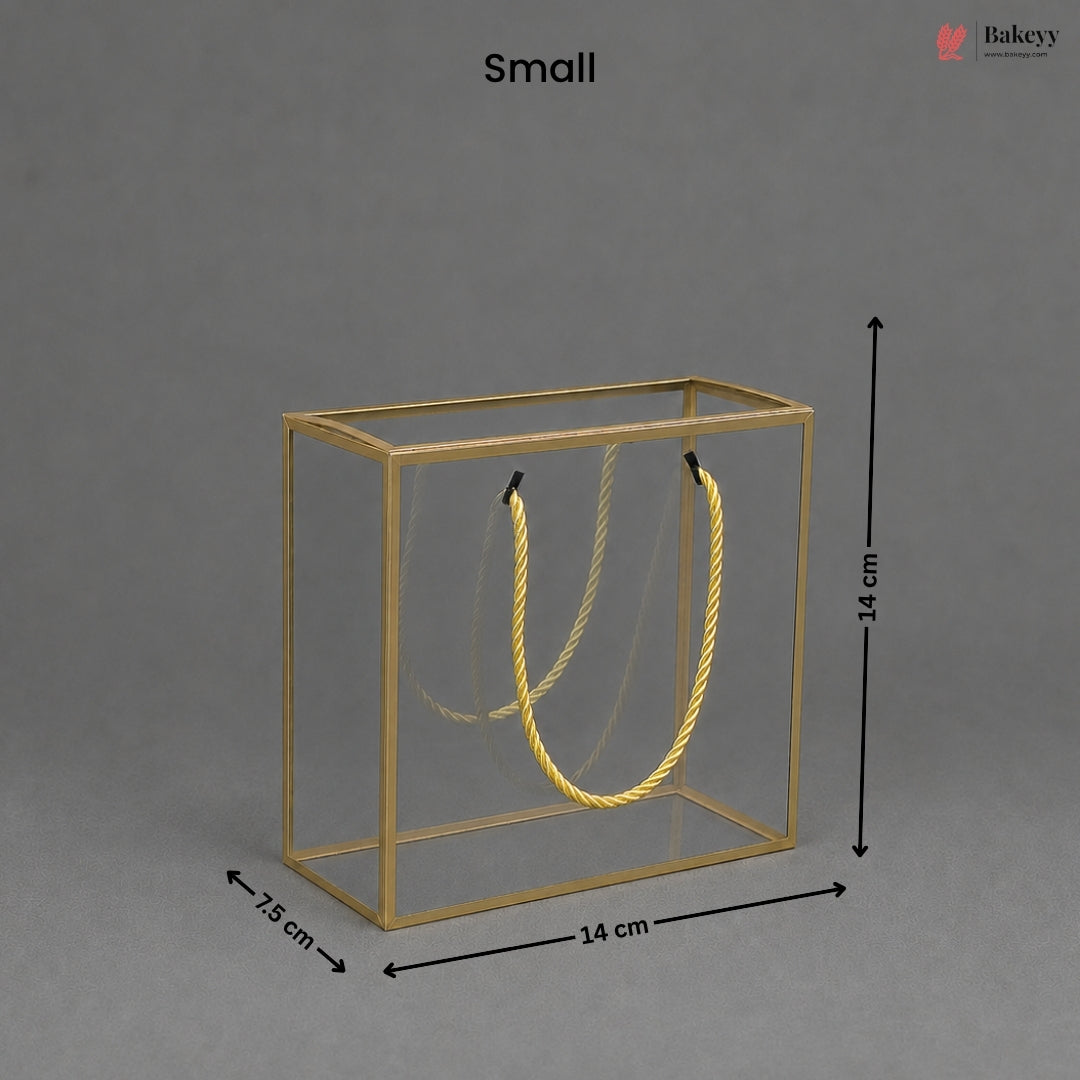 Small gold jewelry display box with dimensions on a gray background