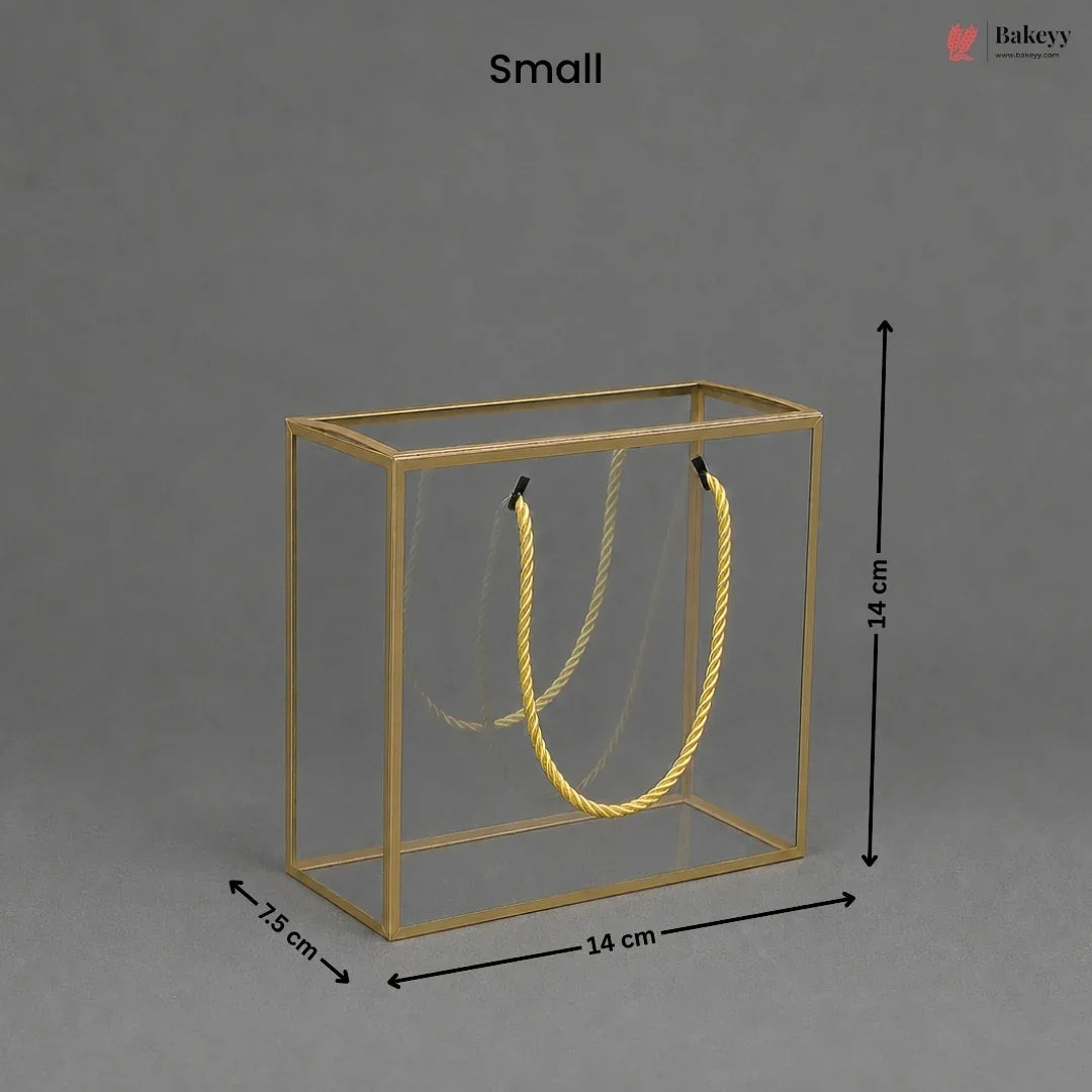 Small gold jewelry display box with dimensions on a gray background