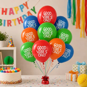 Colorful balloons with 'Good Vibes Only' text on a birthday celebration setting.