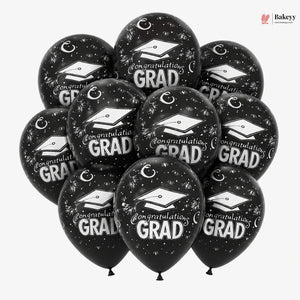 Black balloons with 'Congratulations Grad' text and graduation caps on a white background