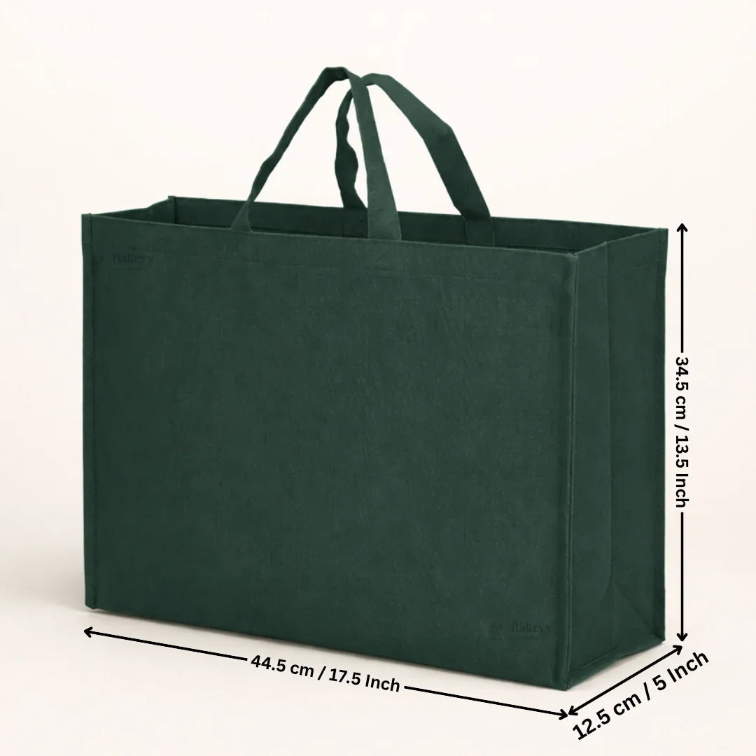 Green tote bag with measurements on a white background