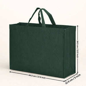Green tote bag with measurements on a white background