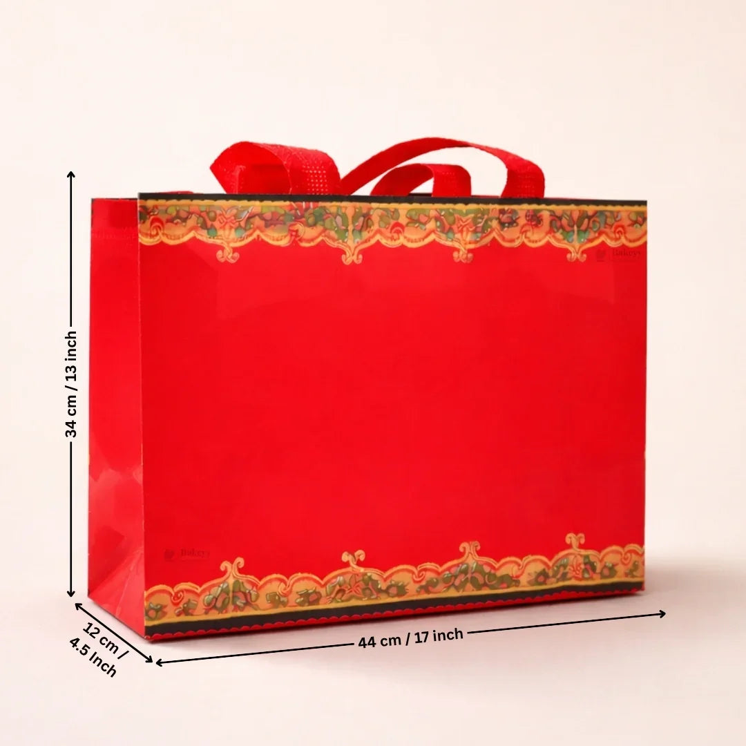 Red gift bag with decorative border and dimensions on a beige background