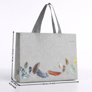 Tote bag with feather design and measurements on a white background