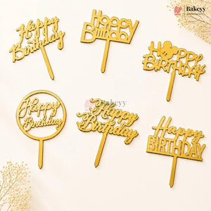 Set of gold 'Happy Birthday' cake toppers on a light background with 'Bakeyy' branding.