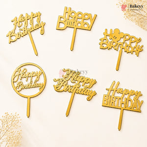 Set of gold 'Happy Birthday' cake toppers on a light background with 'Bakeyy' branding.