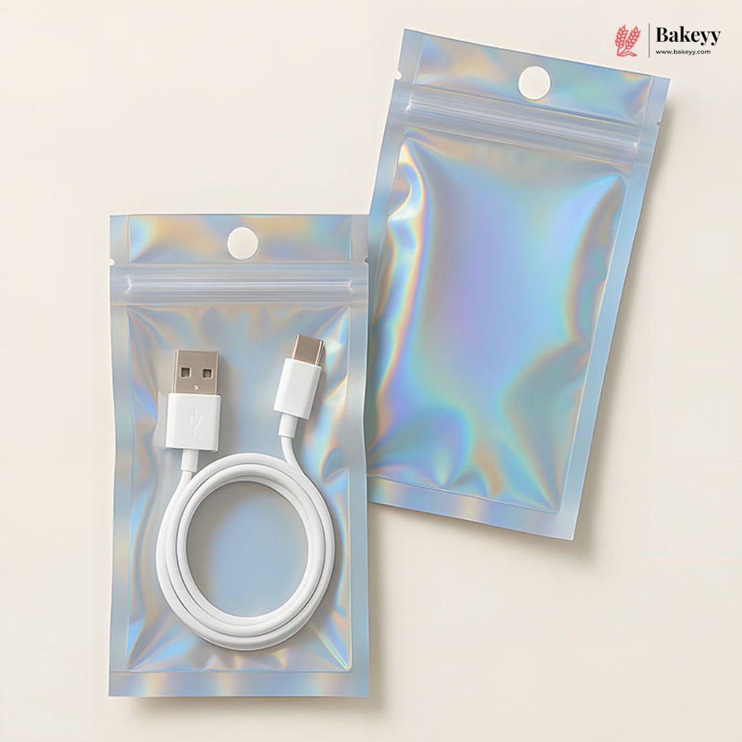 Two holographic zip-top pouches on a light beige background, one containing a white USB cable and one empty. A Bakeey logo appears in the top right corner.