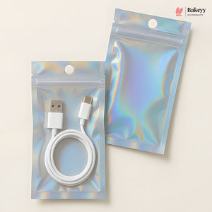 Two holographic zip-top pouches on a light beige background, one containing a white USB cable and one empty. A Bakeey logo appears in the top right corner.