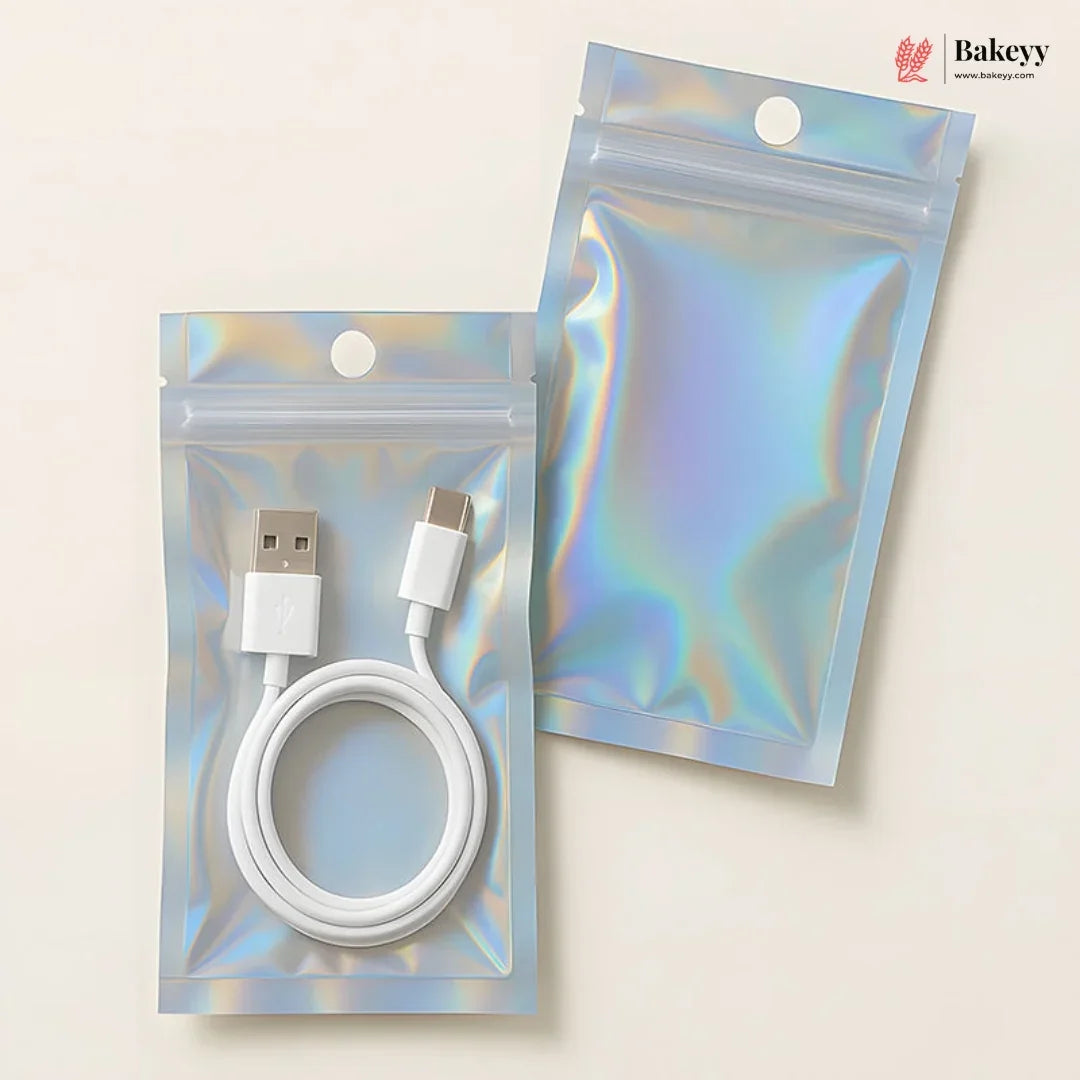 Two holographic zip-top pouches on a light beige background, one containing a white USB cable and one empty. A Bakeey logo appears in the top right corner.