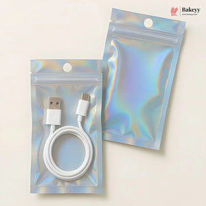 Two holographic zip-top pouches on a light beige background, one containing a white USB cable and one empty. A Bakeey logo appears in the top right corner.