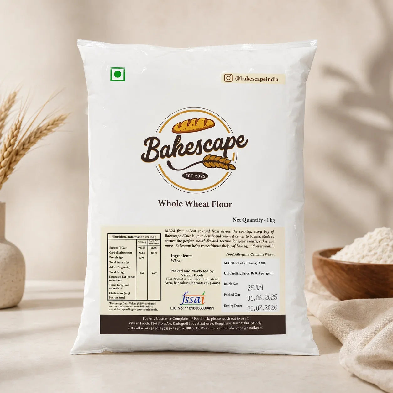 Bag of Bakescape whole wheat flour with branding and product details on a neutral background.