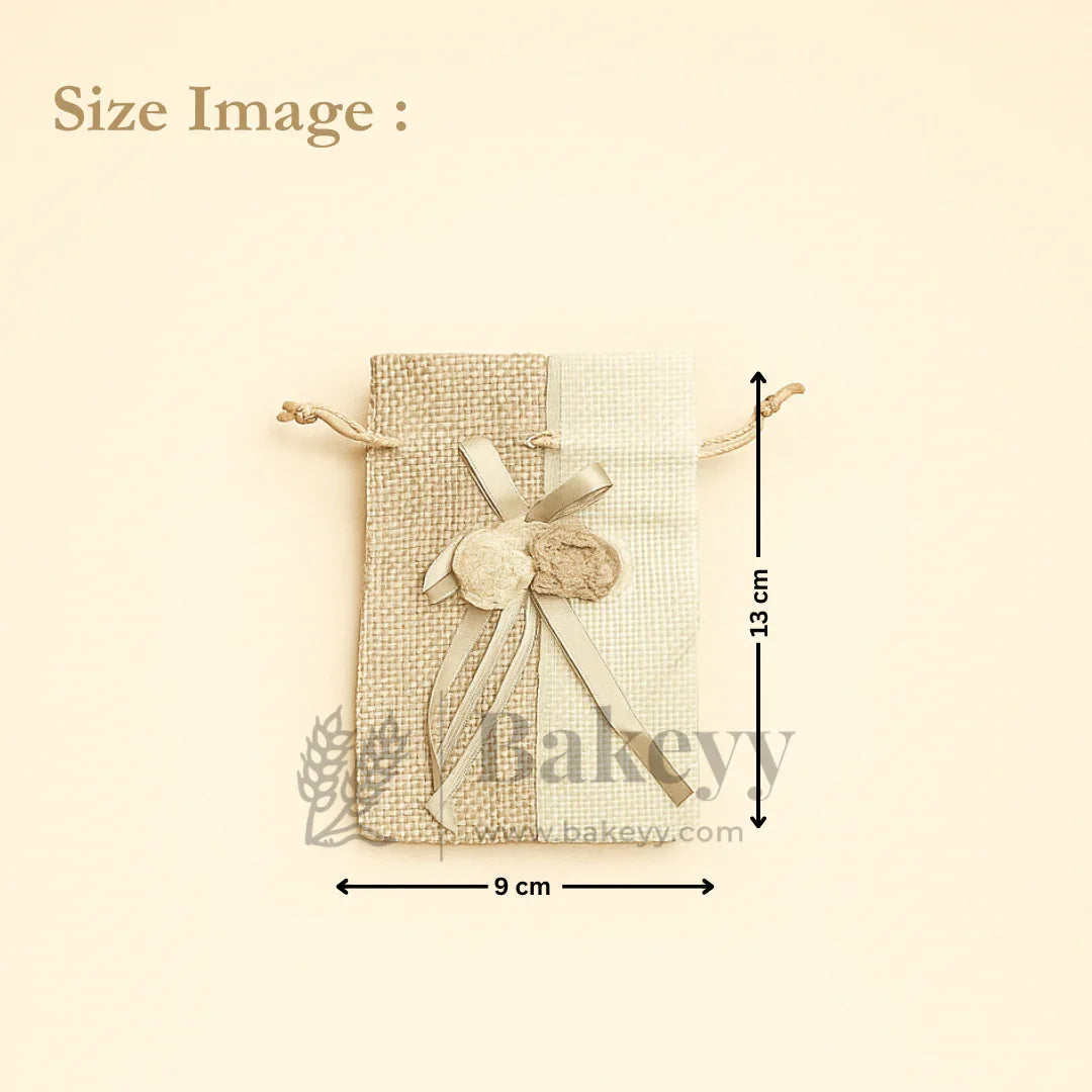 Jute potli bag with floral accents, ribbon, and drawstring, 9x13 cm, wholesale gift packaging at Bakeyy.com