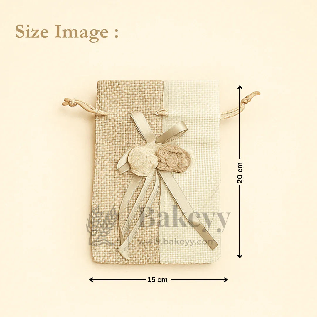 Jute potli bag with floral accents, ribbon bow, 15x20cm, ideal for gift packaging from Bakeyy.com
