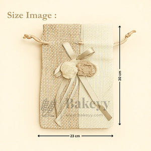 Jute potli gift bag with floral accents, ribbon bow, 23x30 cm, wholesale packaging from Bakeyy.com