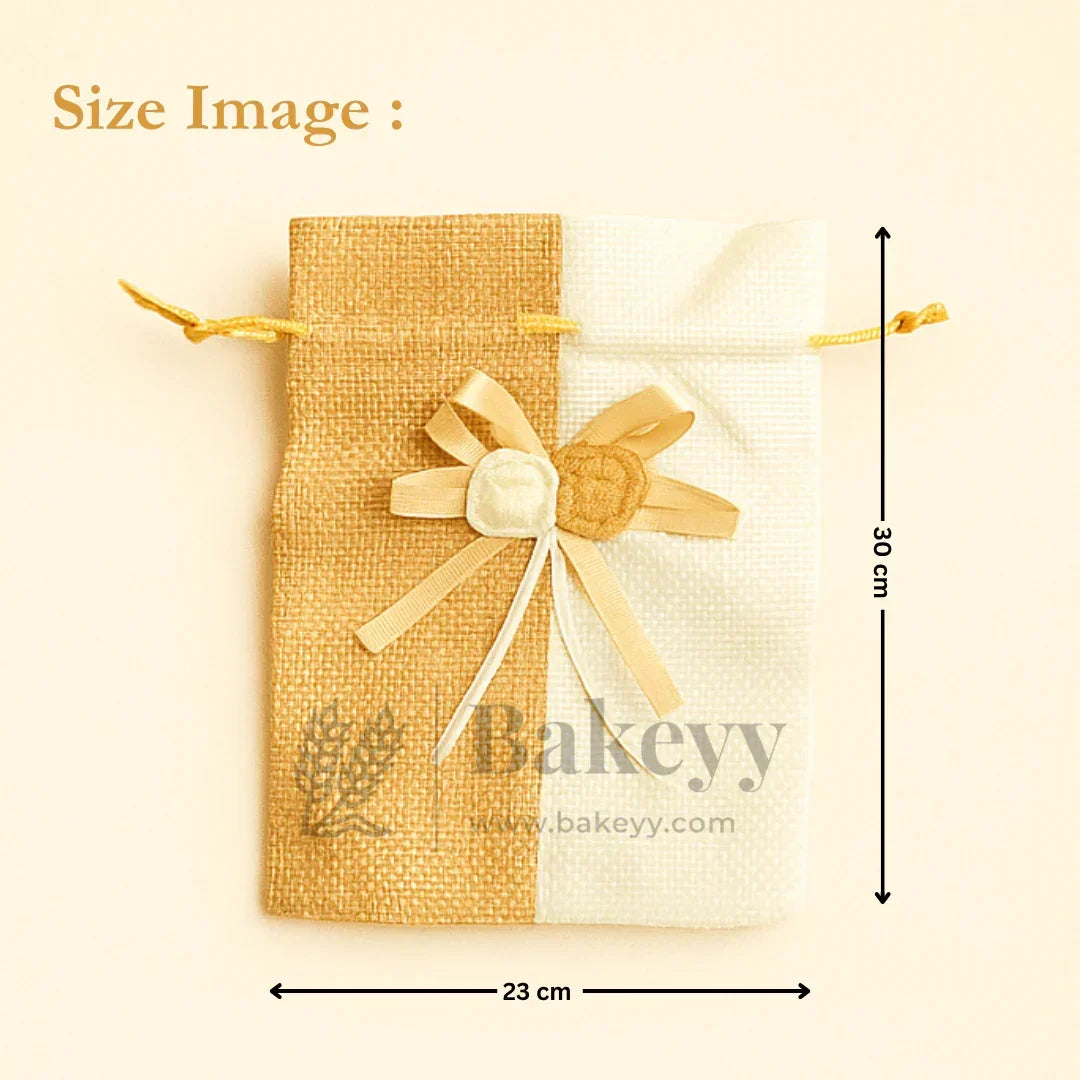 Jute potli bag with floral accents, drawstring closure, 23x30 cm, Bakeyy gift packaging.