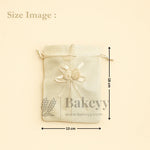 Jute_potli_with_floral_accents_6 - Bakeyy.com