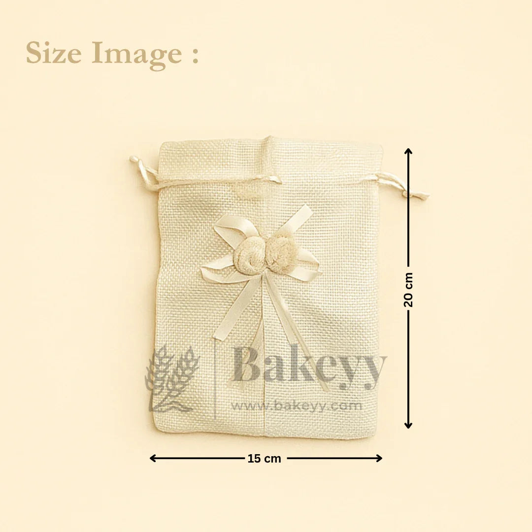 Jute potli bag with floral accents, cream color, 15x20 cm, gift packaging on Bakeyy.com