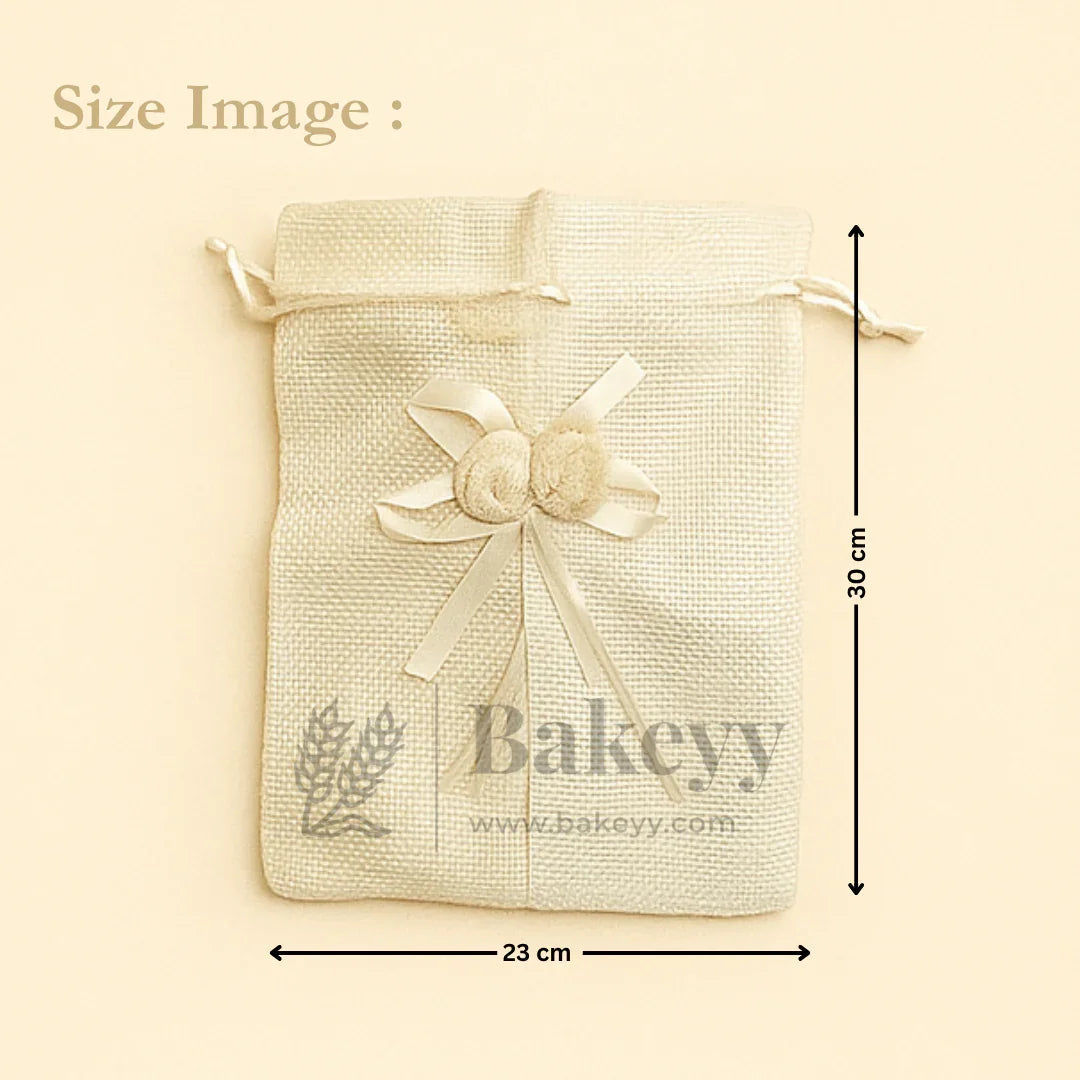 Cream jute potli gift bag with floral accents, ribbon, 23x30 cm, Bakeyy packaging supplies
