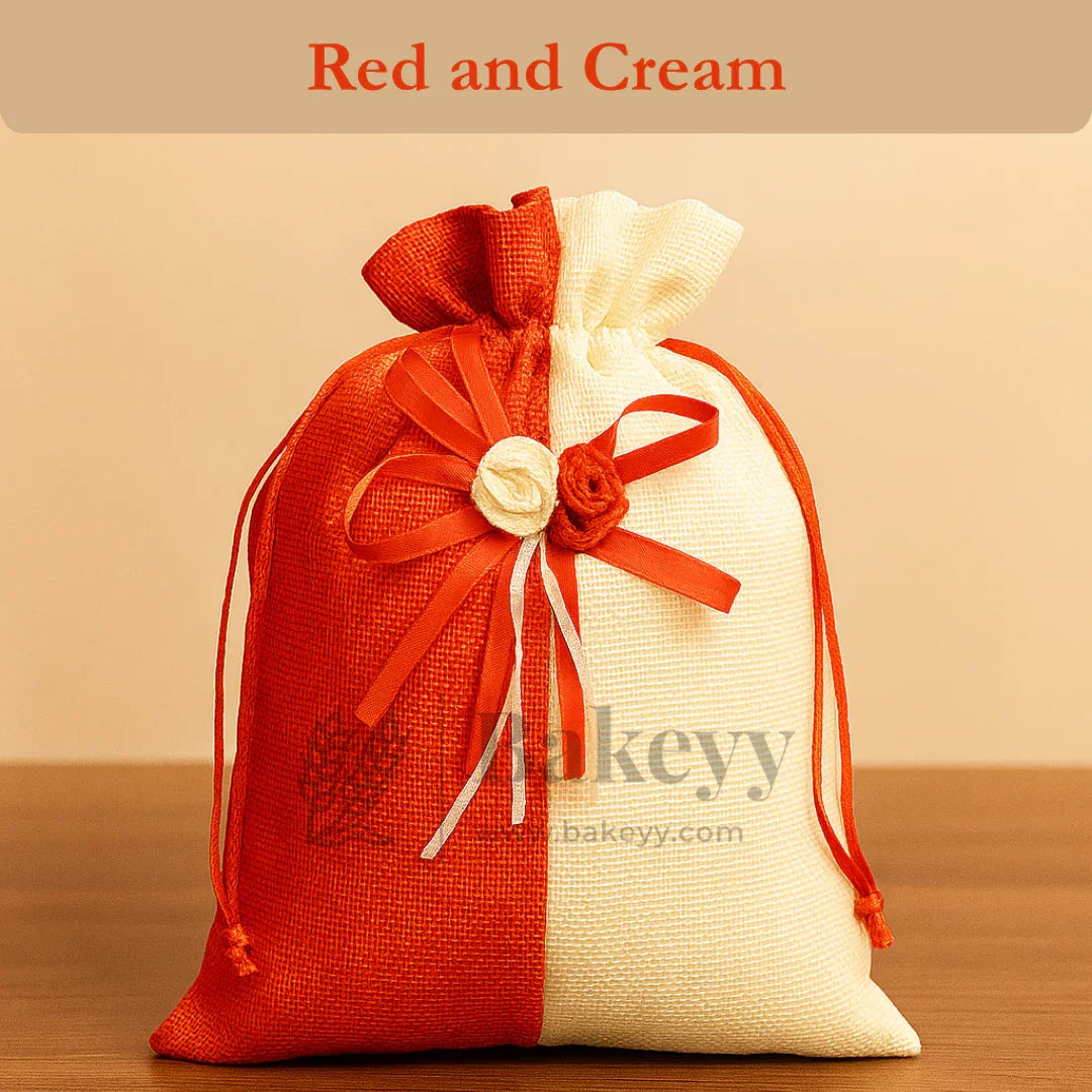 Red and cream jute potli gift bag with floral accents, Bakeyy gift packaging supply
