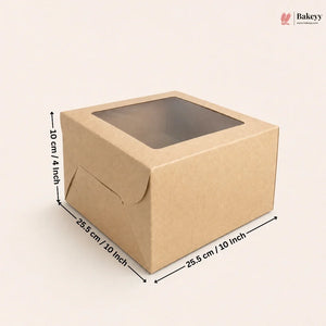 A square brown kraft paper bakery box with a clear window on top, shown with dimension arrows and labels indicating 25.5 cm by 25.