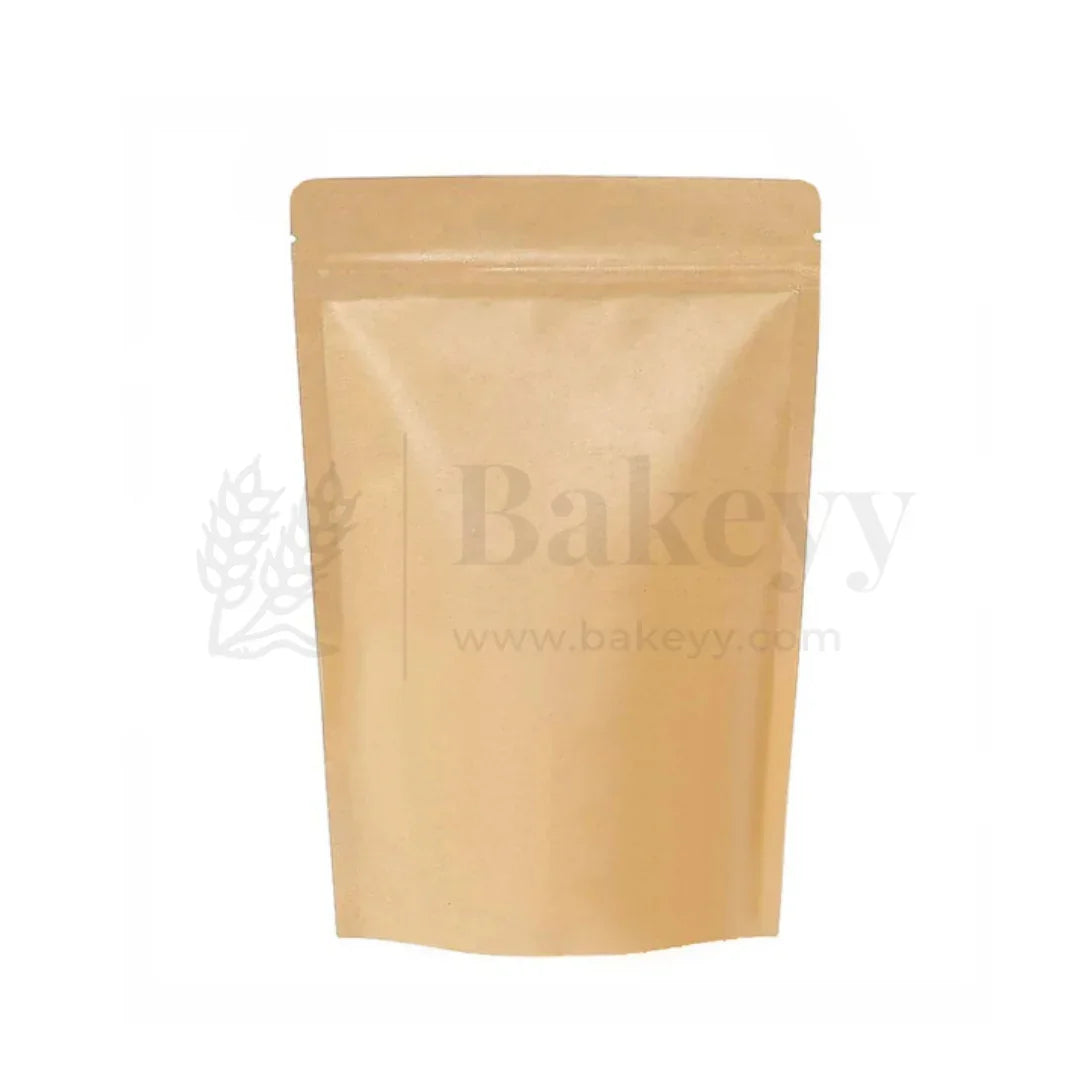 Kraft paper stand-up pouch with 'Bakeyy' branding on a white background