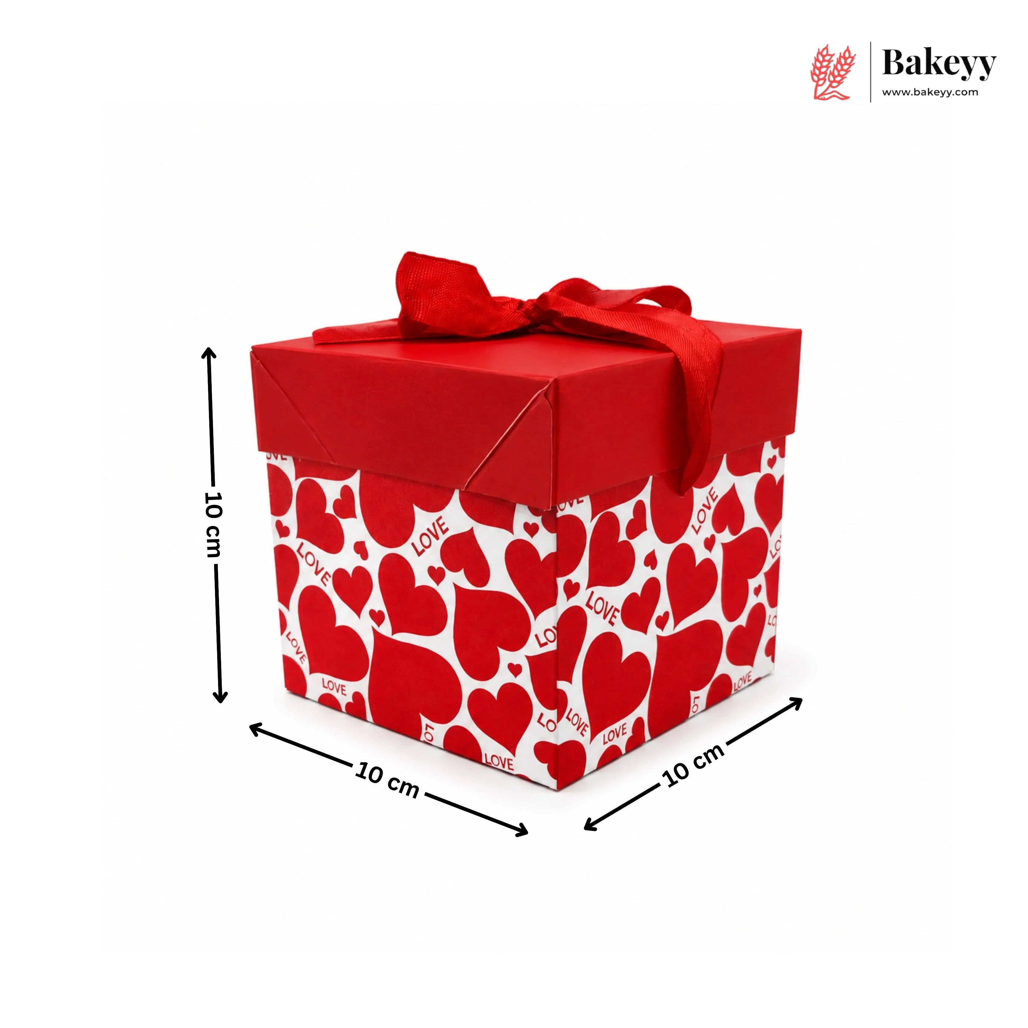 Red gift box with heart pattern and dimensions on a white background, featuring the brand 'Bakeyy'.