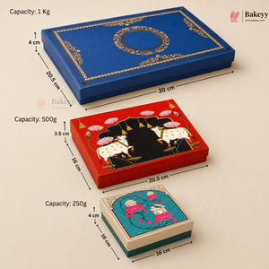 Three decorative rectangular baking boxes shown on a beige background with printed dimensions and capacity labels. The top box is blue with gold ornamental detailing and reads as 30 cm by 20.