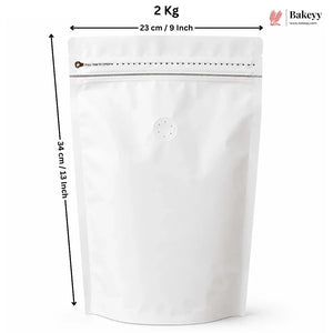 A white stand-up resealable pouch with a zipper and a small round vent hole, shown with dimension arrows indicating 23 cm width and 34 cm height, plus text reading 2 Kg and a Bakeey logo.