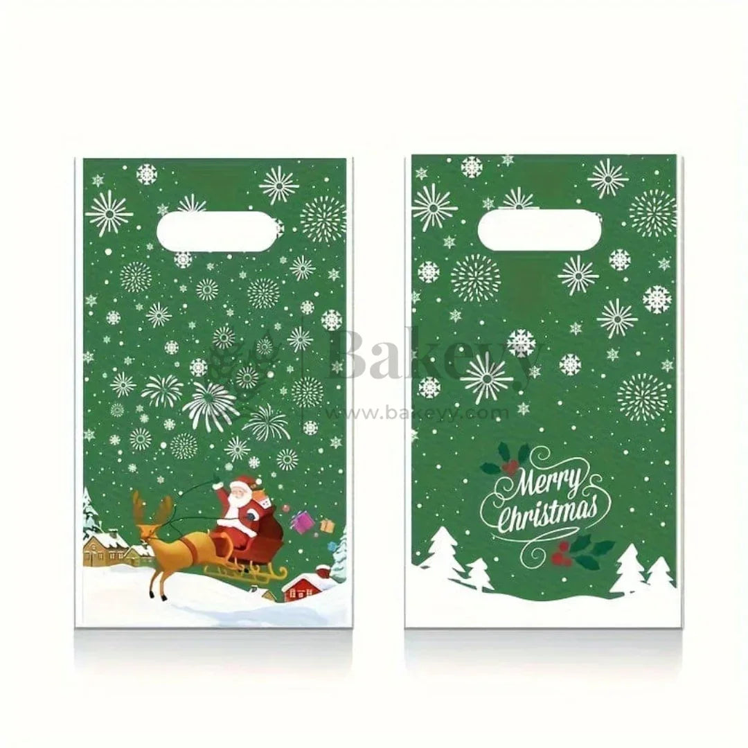 Two Christmas-themed gift bags with Santa Claus and reindeer on a green background.