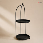 Black metal stand with two round shelves on a beige background