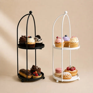 Two tiered dessert stands with pastries on a beige background