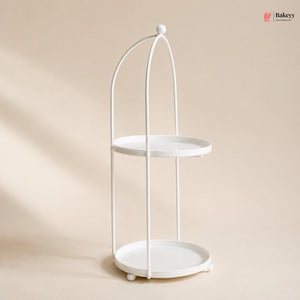 White metal two-tier stand on a beige background