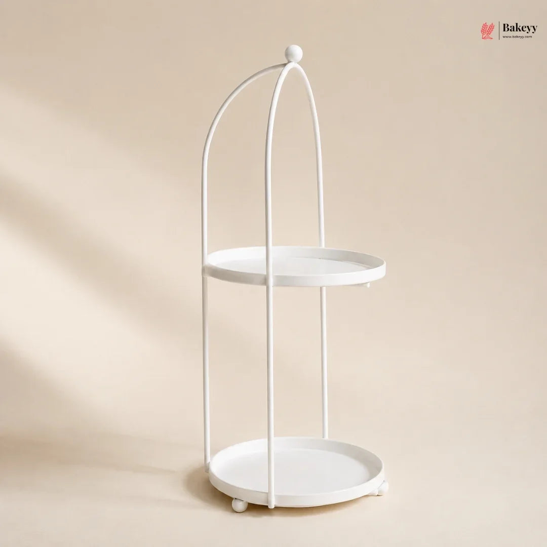 White metal two-tier stand on a beige background