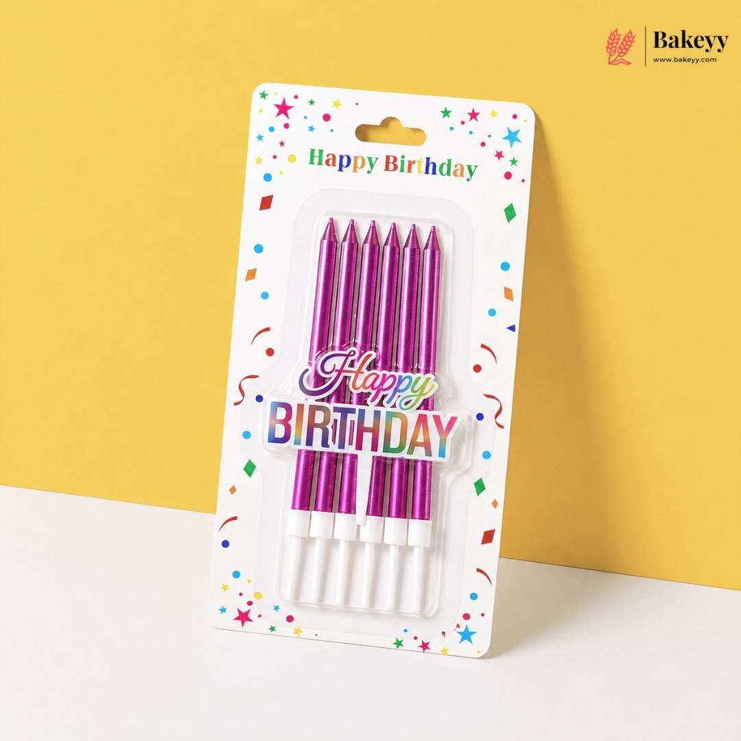 Pack of purple birthday candles with 'Happy Birthday' text on a colorful card against a yellow background
