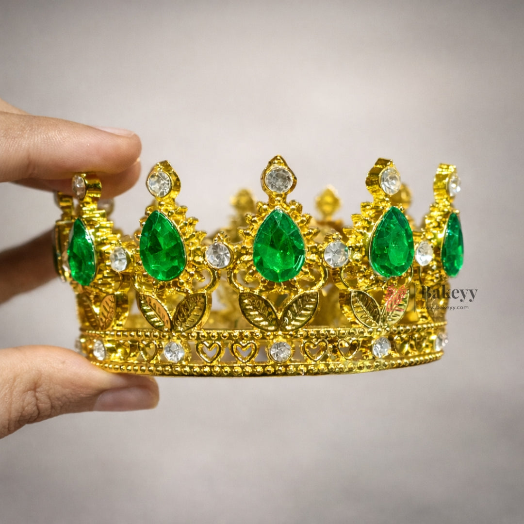 Elegant royal crown design with crystal stones
Premium gold finish with detailed carving
Lightweight and easy to place on cakes
Reusable decorative topper
Perfect for birthday cakes, themed cakes, baby shoots, and table décor
Available in multiple stone color variants