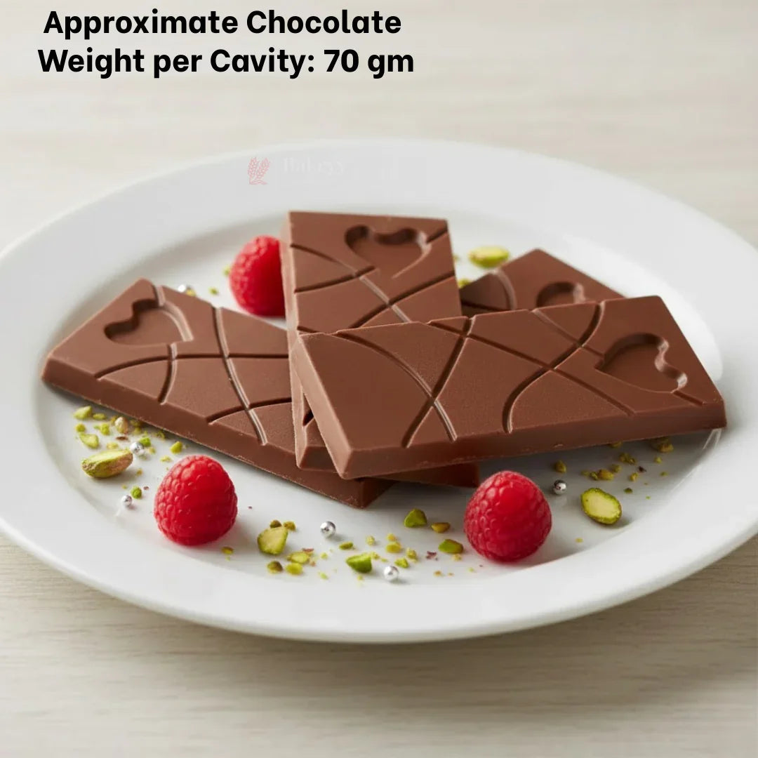 Heartline chocolate bars on a white plate with pistachios and raspberries, Bakeyy baking mould product