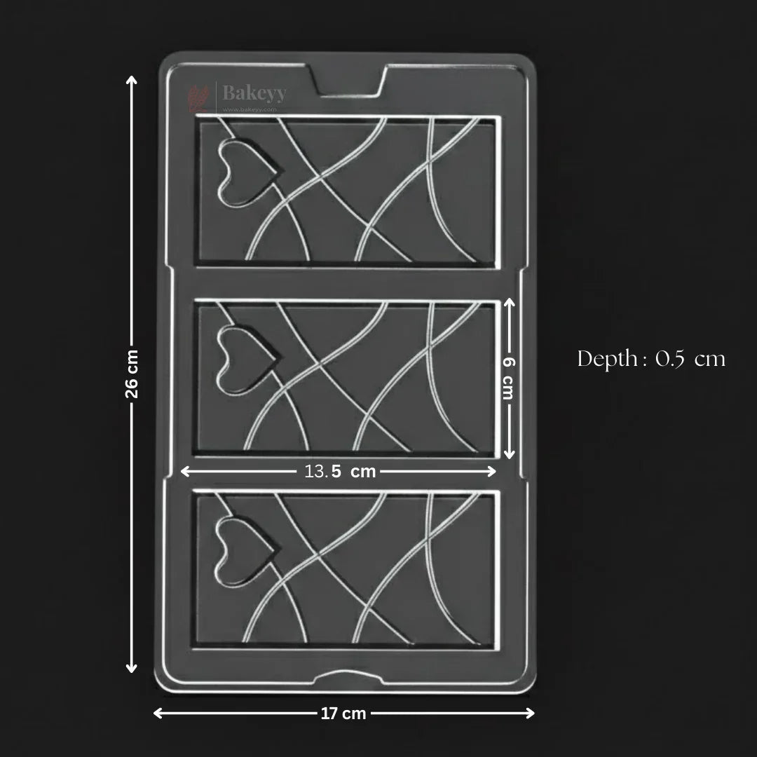 Bakeyy plastic chocolate mould tray with three heart design bar cavities and size measurements, ideal for baking.