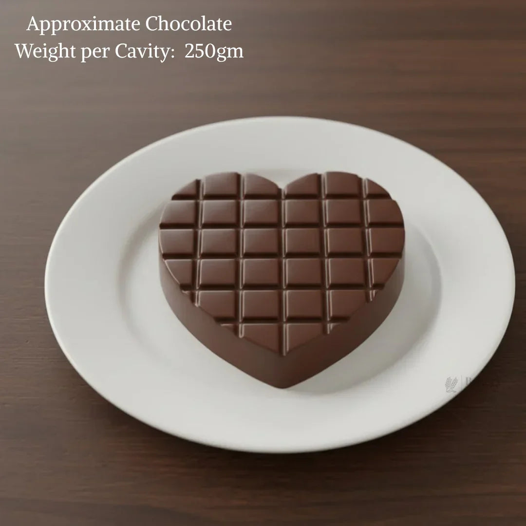Heart-shaped chocolate with grid pattern on a white plate, chocolate mould tray from Bakeyy
