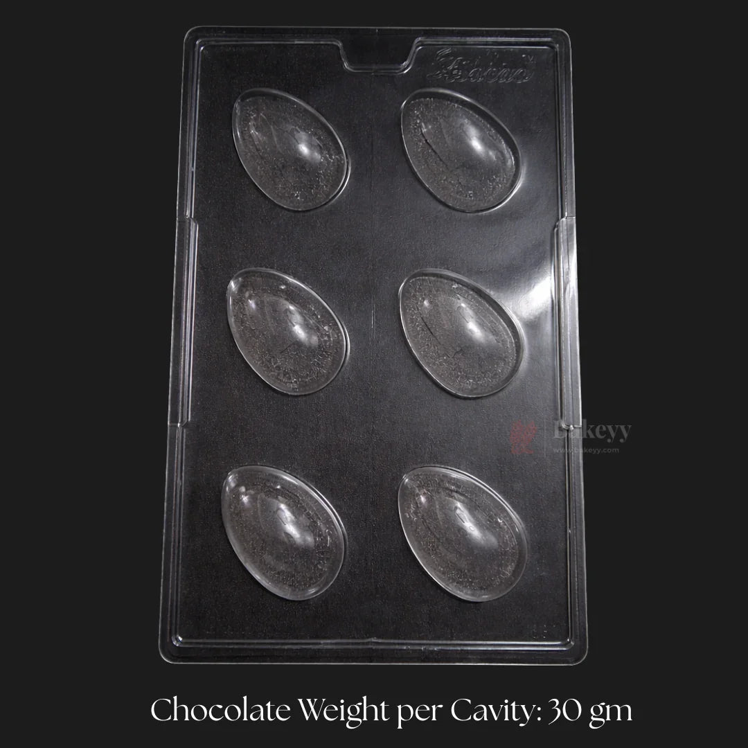 Clear plastic mould tray with 6 smooth Easter egg cavities, chocolate mould from Bakeyy