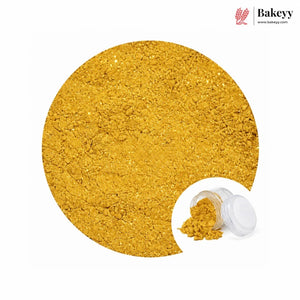 A circular close-up of golden yellow powdered baking ingredient, with a small inset showing the powder in a clear plastic jar with its lid off. The Bakeyy logo is visible in the top right corner on a plain white background.